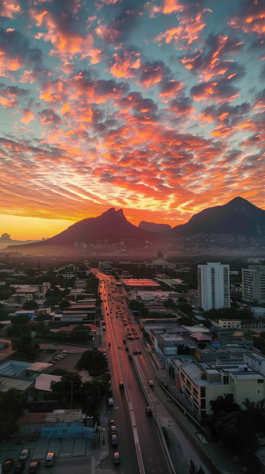 stunning-sunset-monterrey-with-vibrant-clouds-reflecting-city-skyline