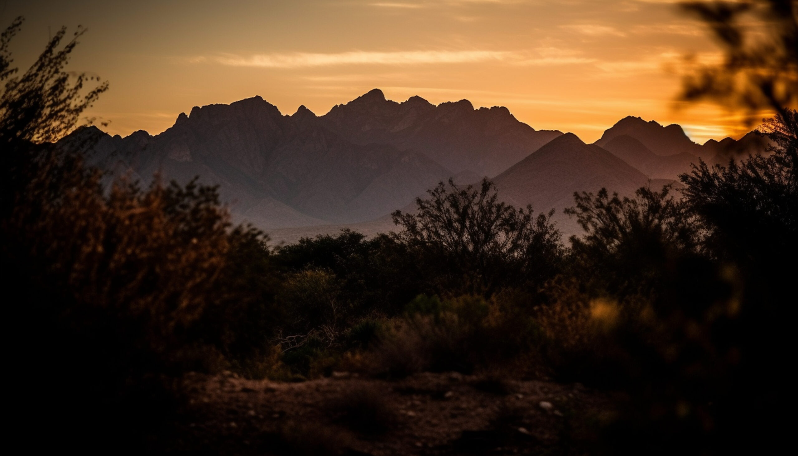 Silhouette of mountain peak at dusk, nature tranquil beauty generated by AI